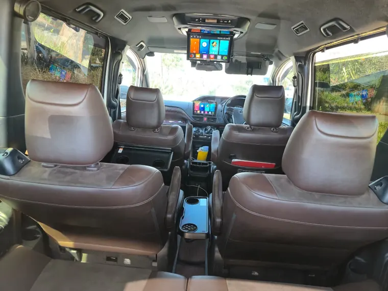 Leather captain seats inside a Novalux executive van