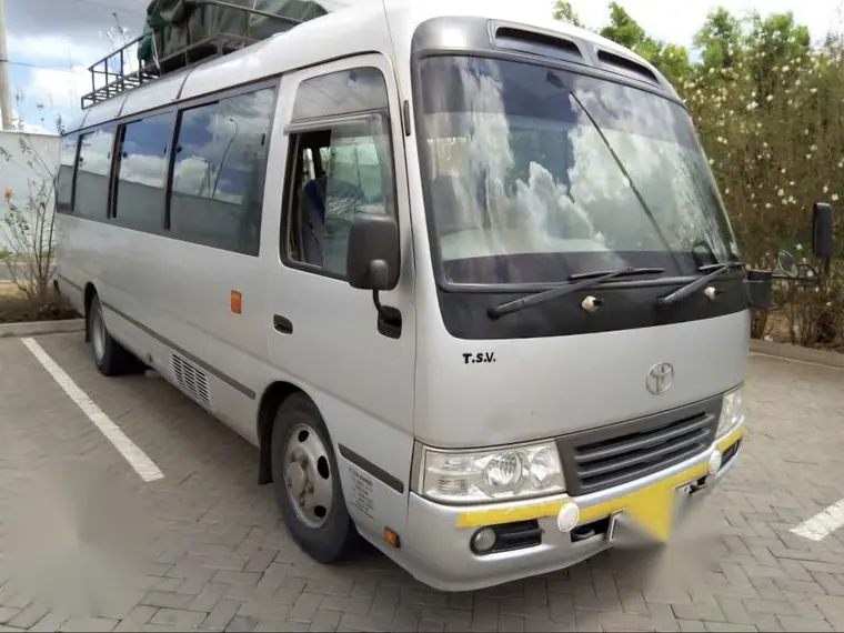 Coaster bus with a roof rack