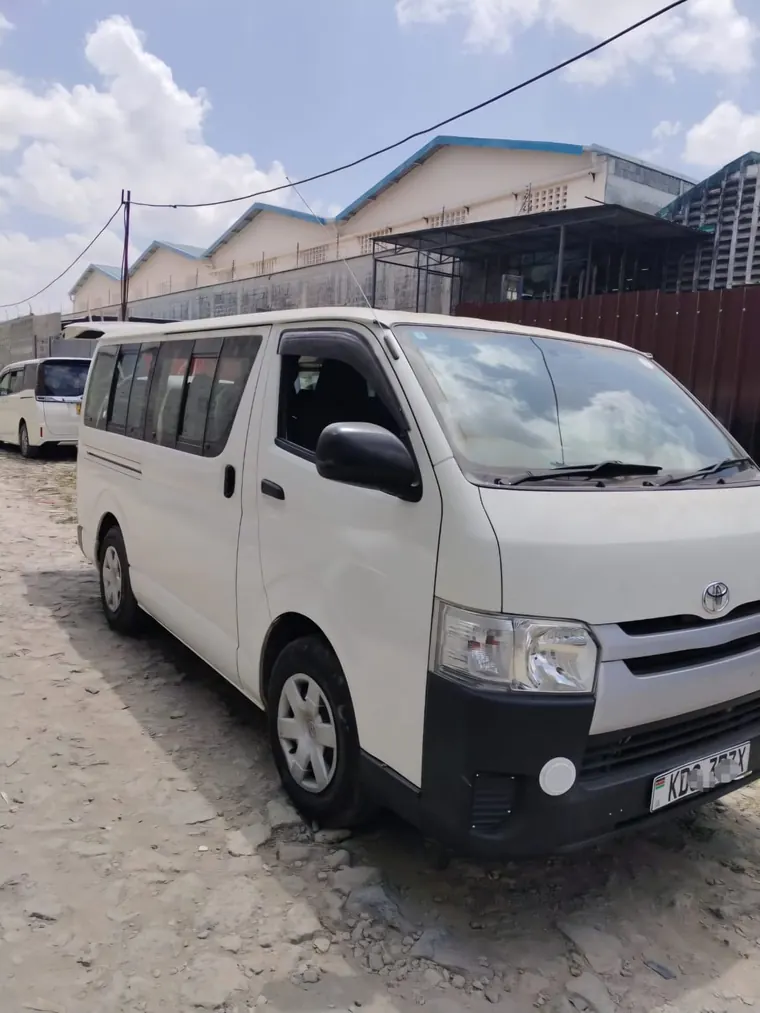White 8 to 14 seater van