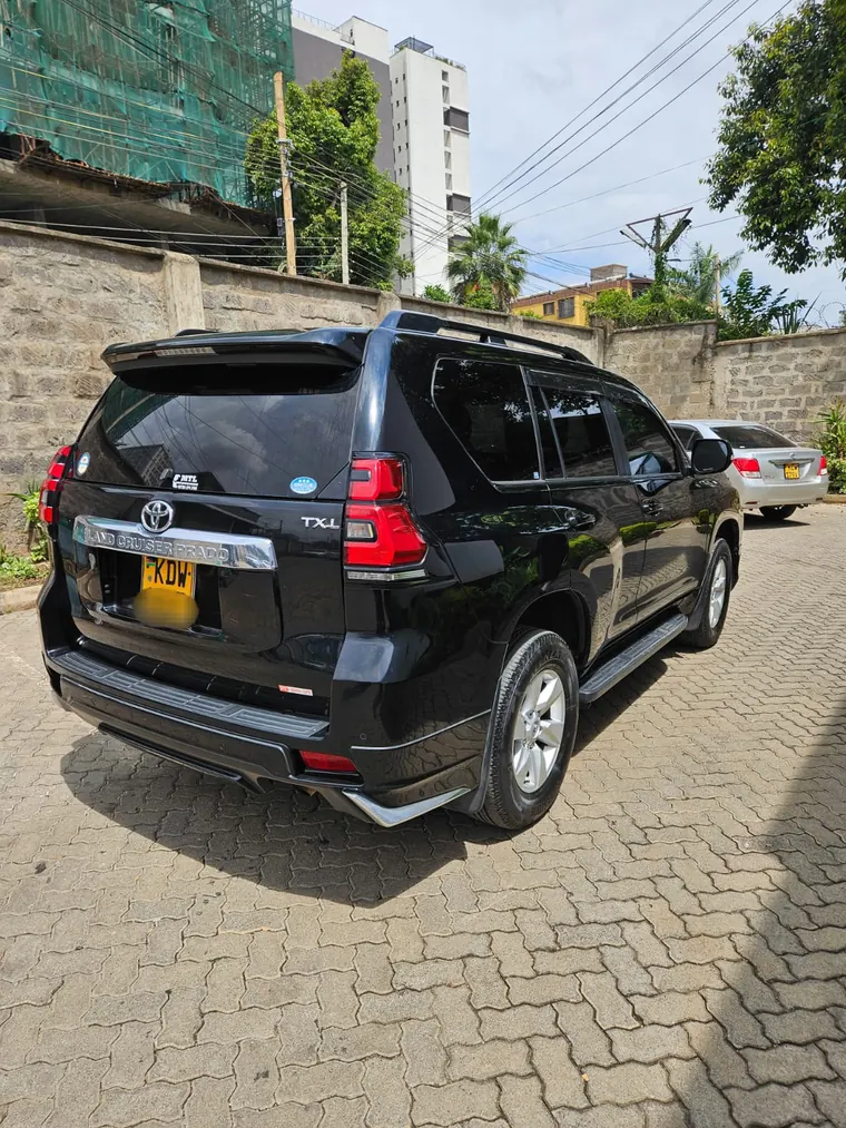 Black SUV parked on a Nairobi street
